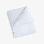Classic Piped Baby Duvet in Blue folded