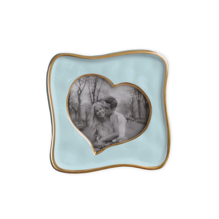 Beatriz Ball Frame Encanto Curved Heart 5 x 5 — Blue heart-opening frame with an illustrative photograph