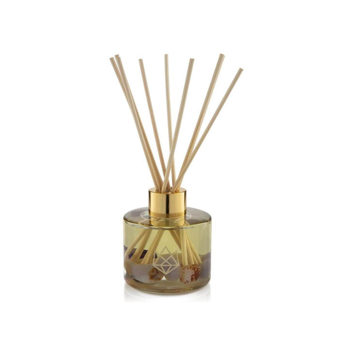 Energy Reed Diffuser | Aluminate Life with clear glass bottle, gold collar, natural reed sticks, and decorative stones, designed to enhance wellness and create a calming atmosphere.