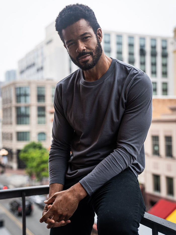 Jarrett is 6', 168lbs and wears a size M # Graphite Long Sleeve Crew Neck Lifestyle Size Medium | Fresh Clean Threads