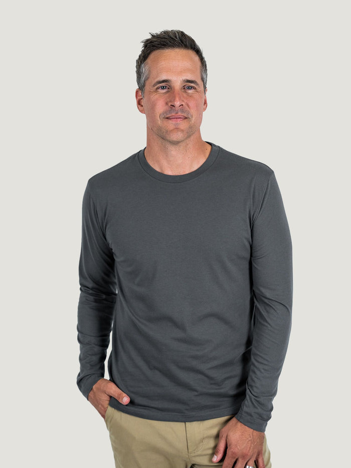 Ben is 6'1, 180lbs and wears a size M # Graphite Long Sleeve Crew Neck Studio Size Medium | Fresh Clean Threads