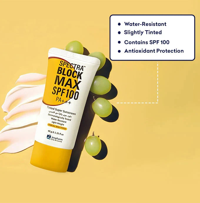 Spectra Block Max SPF 100 sunscreen tube with grapes on a yellow background