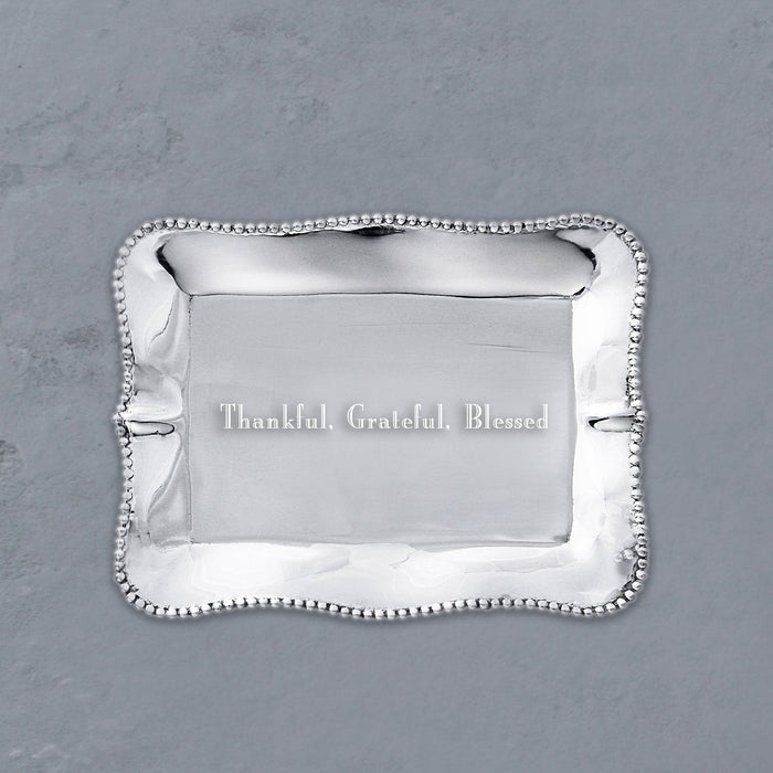 Beatriz Ball Giftables Pearl Denisse Rectangular Engraved Tray "Thankful, Grateful, Blessed" — Engraved tray on a gray surface