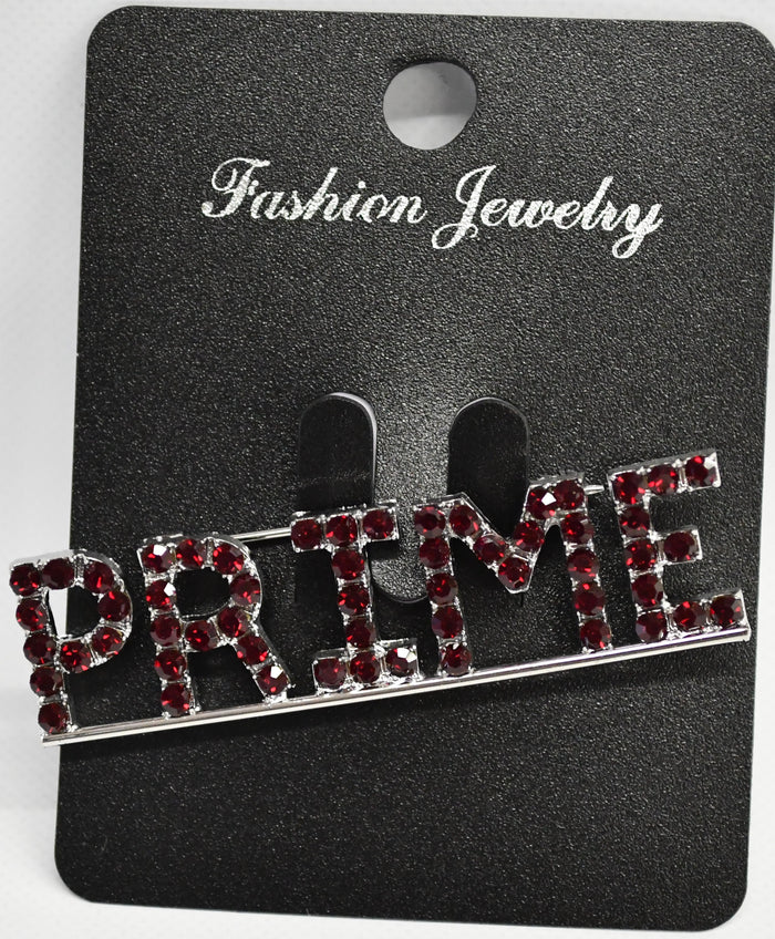 Jewelry pin with 'PRIME' text on a black card labeled 'Fashion Jewelry'.