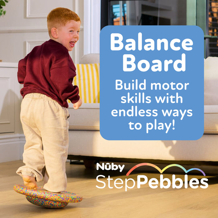 A young child smiles while balancing on a colorful board in the living room. Text reads: StepPebbles and FREE Balance Board | Primary. Build motor skills and explore eco-friendly play with versatile foam stepping stones!.