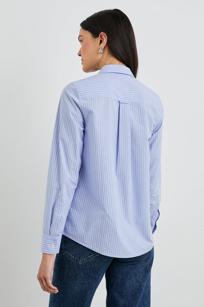 Stina Long-Sleeve Button Up with a Chest Patch Pocket in Oxford White Stripe Colorway, Thin White Vertical Stripes on Blue - Back View Featured on Model